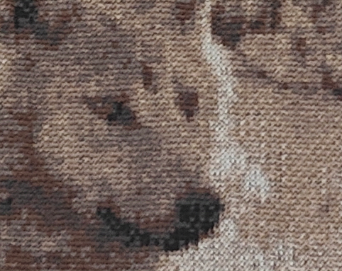 Close-up detail of Wolf acoustic art textile texture and merino wool stitches